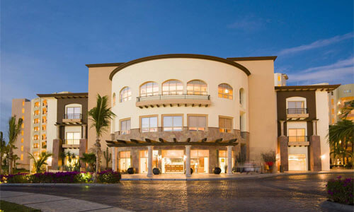 Picture of a beautiful building in Cabo, San Lucas, Mexico.  The picture was taken near sunset and shows soft brown and tan colors.